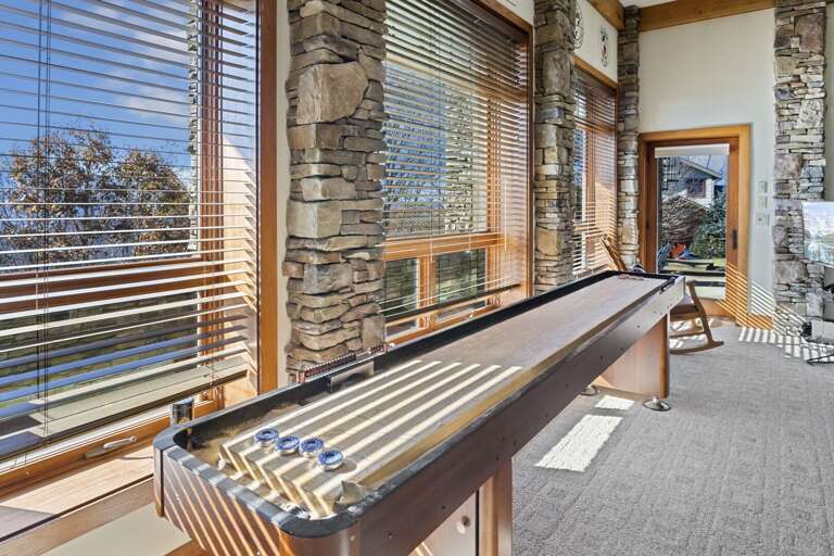 Shuffleboard Table Overlooks the Backyard Shuffleboard Table Overlooks the Backyard