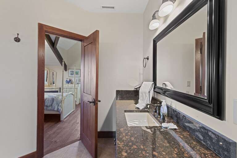 Upstairs Full Bathroom with Double Vanity shared between Full and Twin Rooms Upstairs Full Bathroom with Double Vanity shared between Full and Twin Rooms