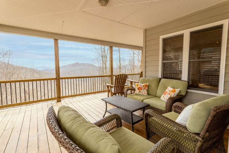 Comfortable Covered Deck Seating with Long Range Mountain Views