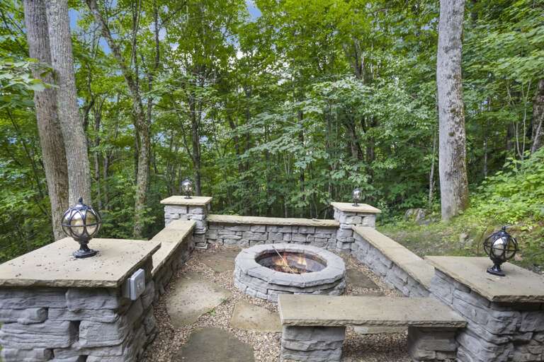 Fire pit with Plenty of Seating in Private Wooded Setting