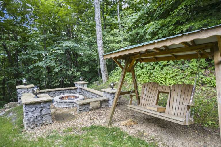 Fire Pit and Swing in Private Wooden Setting