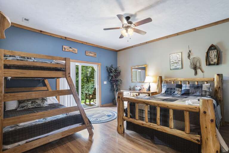 Lower Level Bedroom Sleeps Five with Queen Log Bed and Separate Twin Over Full Bunk.