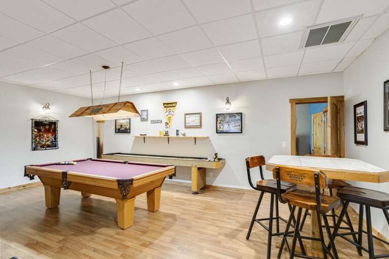 Pool Table and Shuffleboard Table in Game Room