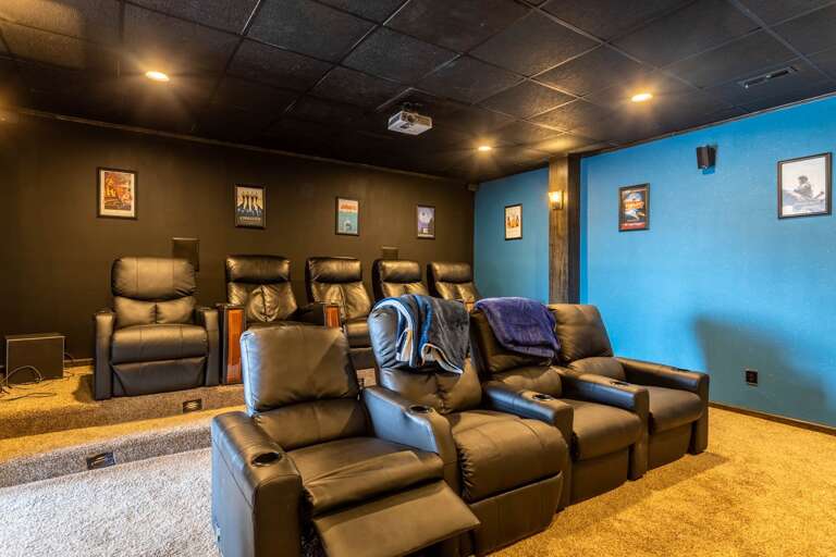 Wildlife Manor Cinema with Theatre Lighting, Luxury Leather Seating, 115 Inch Projection Screen, Surround Sound and Plenty of Floor Lounging space