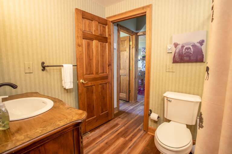 Full Bathroom off the Bunk Room with a Combo Tub and Shower