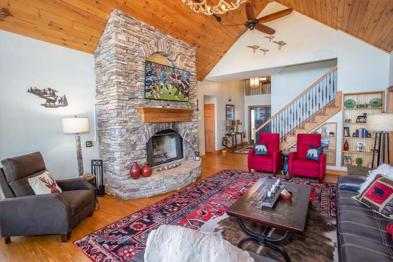 Rock Fireplace with Wood-Burning Fireplace and Smart TV