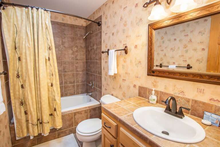 Upstairs Bathroom with Combo Tub and Shower