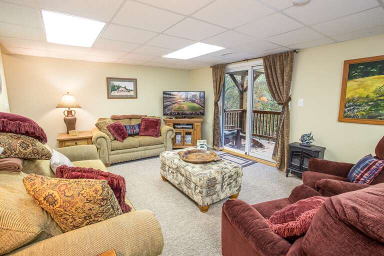 Large Flat Screen TV with Lots of Comfy Seating