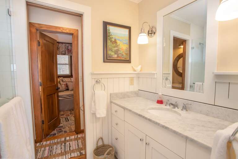 Jack & Jill Full Bathroom off of Main Level Queen Bedroom and Sitting Room with Daybed