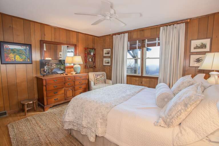 Main Level Queen Bedroom with HD Smart TV and Mountain Views