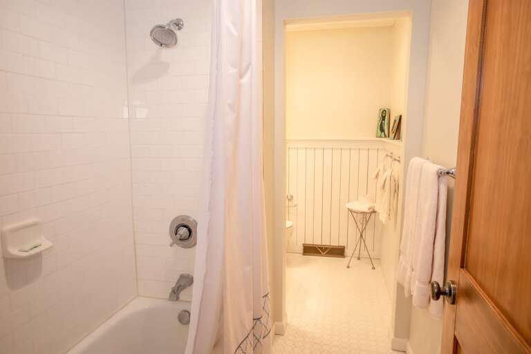 Private EnSuite Full Bathroom with Tub and Shower Combo in Twin Suite