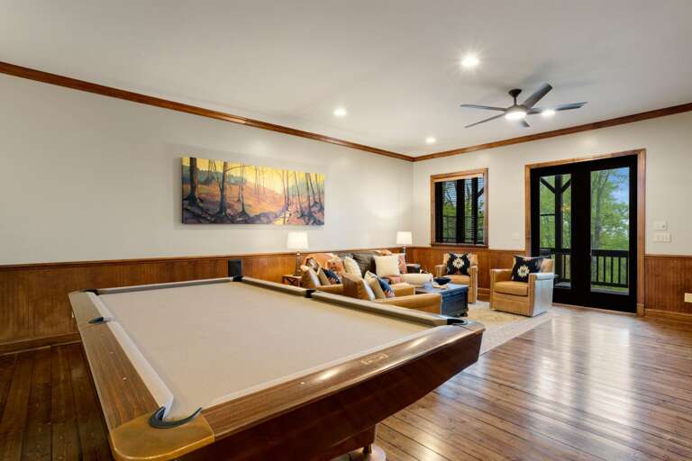 Eight-Foot Slate Pool Table in Lower Level Game Room and Den