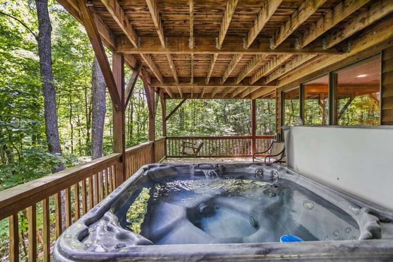 Hot Tub and Porch Swing on the Lower Level Deck