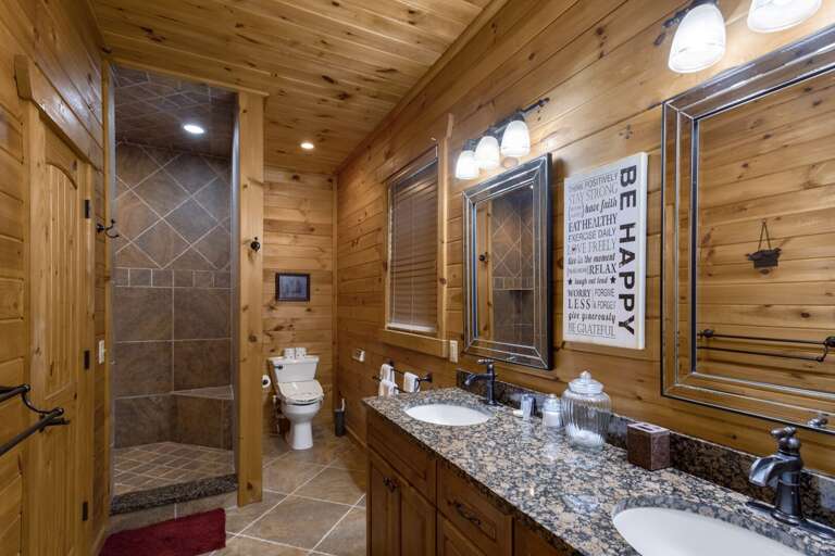 Tiled Shower and Toilet with Heated Seat in Master Bathroom