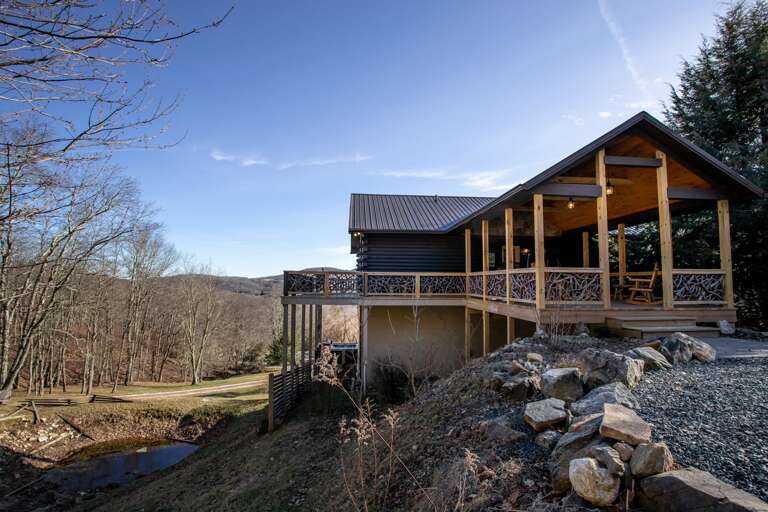 Looking at Front Porch and Front Door, as well as Small Creek-fed Pond, from 1 of 2 Parking Areas Looking at Front Porch and Front Door, as well as Small Creek-fed Pond, from 1 of 2 Parking Areas