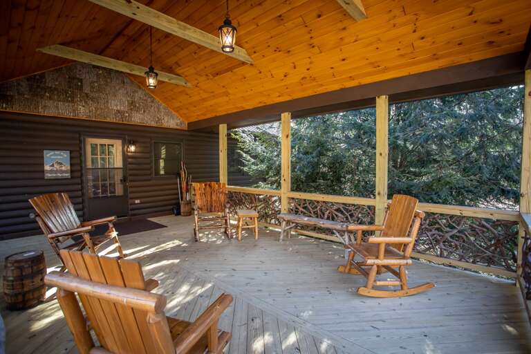Large Front Porch under Vaulted Tongue-in-Groove Ceilings and Exposed Beams Large Front Porch under Vaulted Tongue-in-Groove Ceilings and Exposed Beams