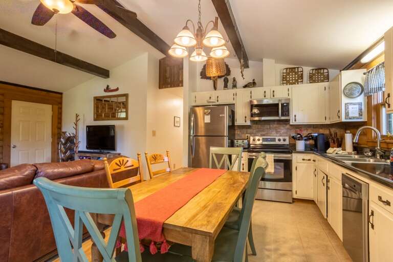 Kitchen with Granite Counter Tops and Stainless Steel Appliance