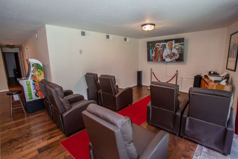 Lower Level Open Theater Room with Huge Screen TV, Leather Theater Seating, Arcade Game, and more! Lower Level Open Theater Room with Huge Screen TV, Leather Theater Seating, Arcade Game, and more!