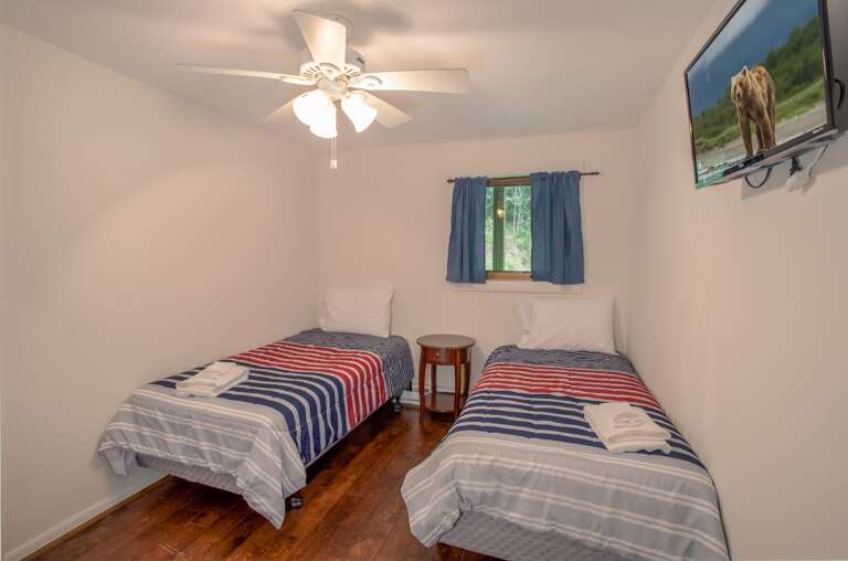 Lower Level Twin Bedroom with 2 Twin Bed and an HD Smart TV Lower Level Twin Bedroom with 2 Twin Bed and an HD Smart TV