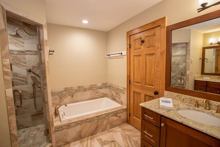 Private EnSuite Master Bathroom with Soaking Tub and Tile Shower Private EnSuite Master Bathroom with Soaking Tub and Tile Shower