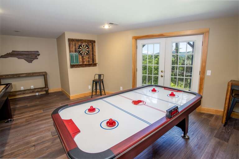 Game Room with Glass Door onto Courtyard and which Frames Mountain Views!
