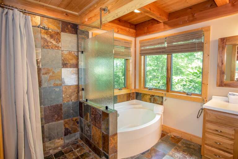 Master Bathroom with Large Slate Tile Shower and Large Soaking Tub