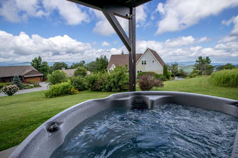 Enjoy the Mountain Views from the Hot Tub tucked away on the Rear Courtyard