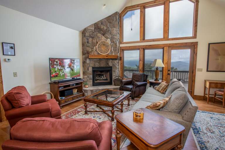Great Room with Fireplace and HD Smart TV at Bald Eagle Bluff