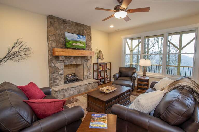 Lower Level Den with Gas Fireplace, HDTV, and Mountain Views