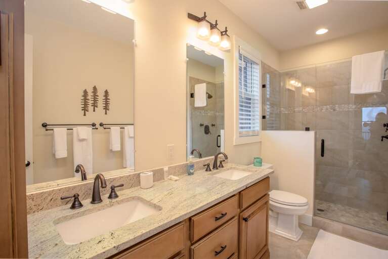 Private Master Bathroom with Double Vanity and Large Tile Walk-In Shower
