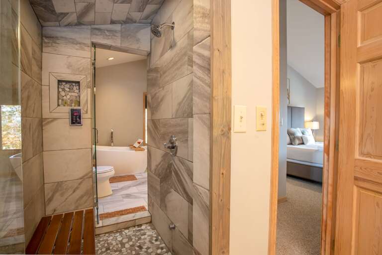 Master Bathroom, Gorgeous Rock and Tile Steam Shower, accessible  from His and Hers sides!