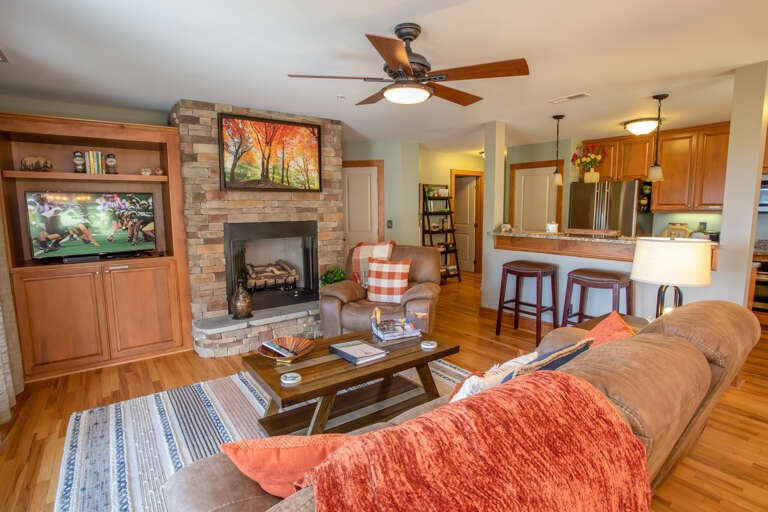 Cozy Living Room with Fireplace and Large HDTV