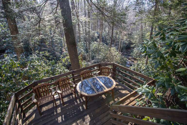 Table and Chairs on Lower Deck Above the Creek Table and Chairs on Lower Deck Above the Creek
