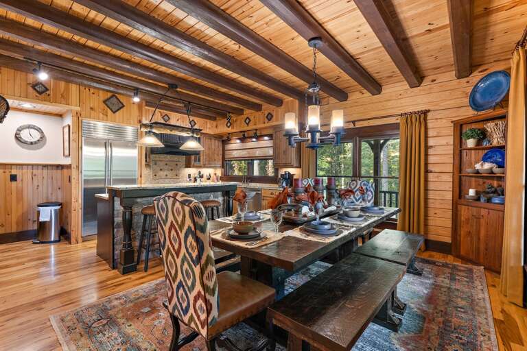 Bench Seating with King and Queen Chairs at the Dining Table