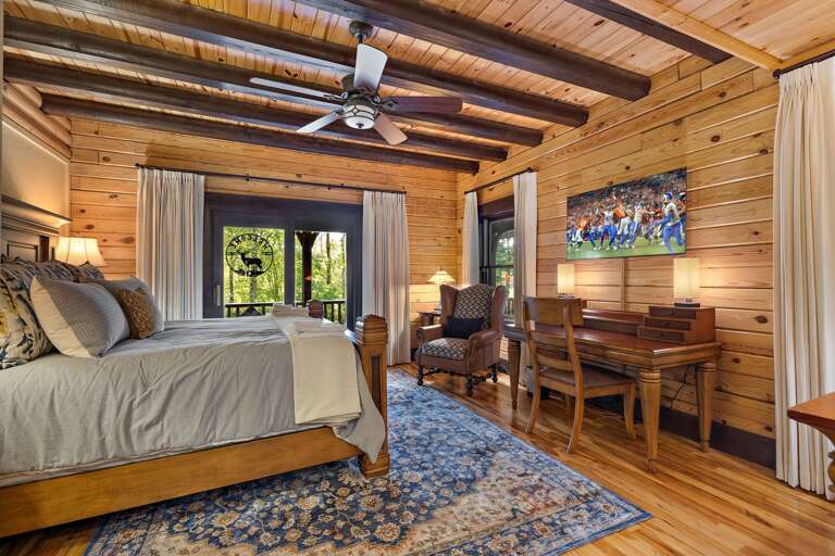 King Bed,TV, and Deck Access in the Master Bedroom