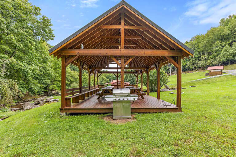 Gas Grill and Covered Outdoor Picnic Tables in the Pavilion