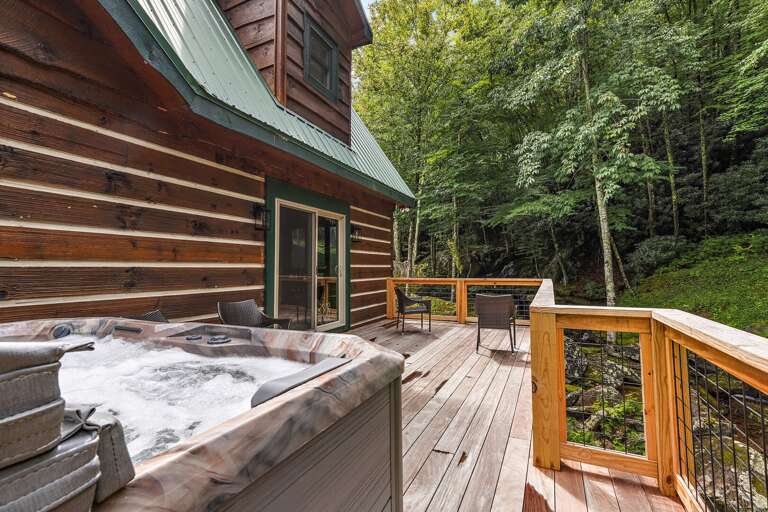 Peaceful Hot Tub Deck with Seating and Flowing Creek Below