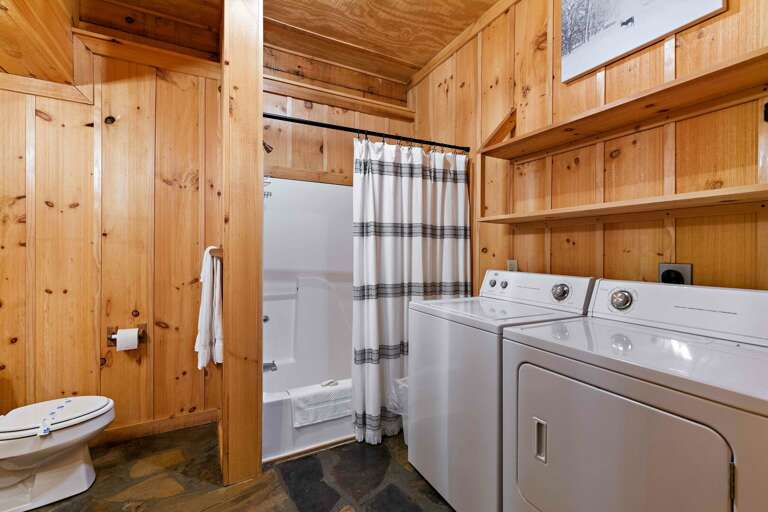 Shared Hall Bathroom with Laundry in Lower Level