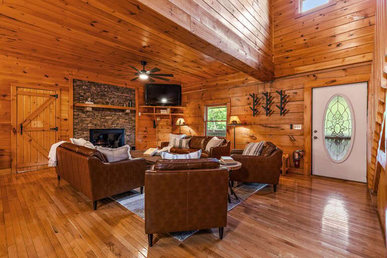 Step into the Main Floor Living Room with Surrounding Floor-to-Ceiling Wood