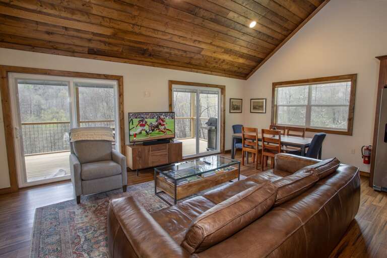 Living Room with Leather Seating and Large HDTV Living Room with Leather Seating and Large HDTV