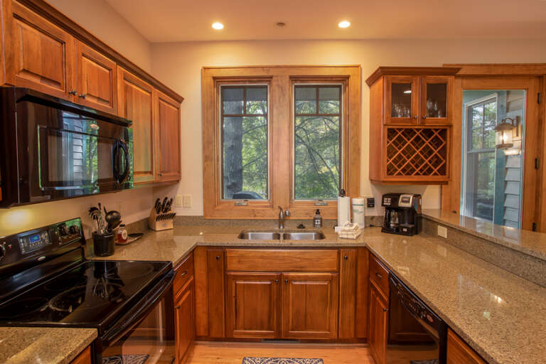 Modern Kitchen with granite counters and bar top seating