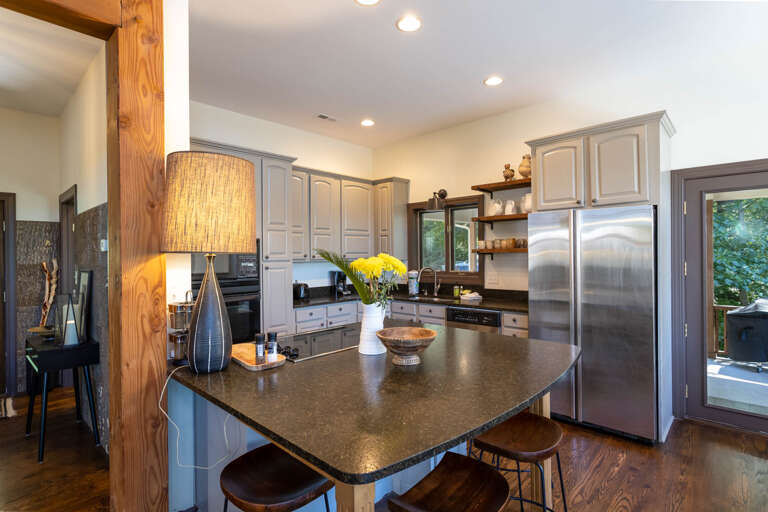 Kitchen with Stainless Fridge