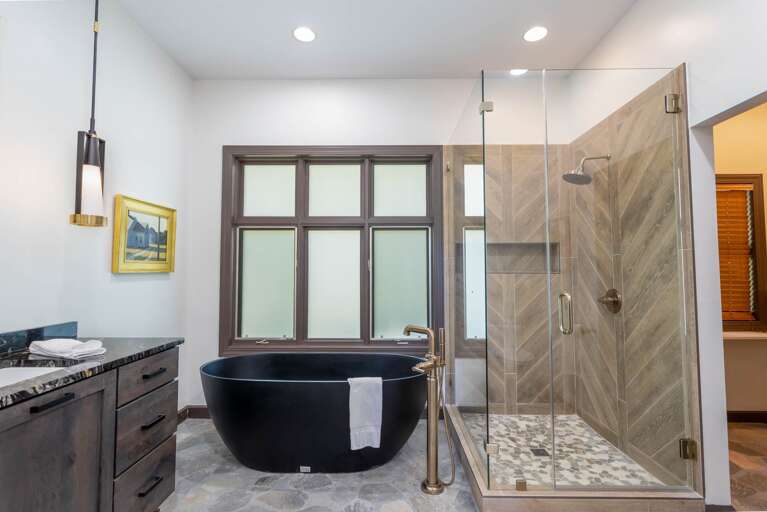 Master Bathroom with Tiled Shower and Soaking Tub