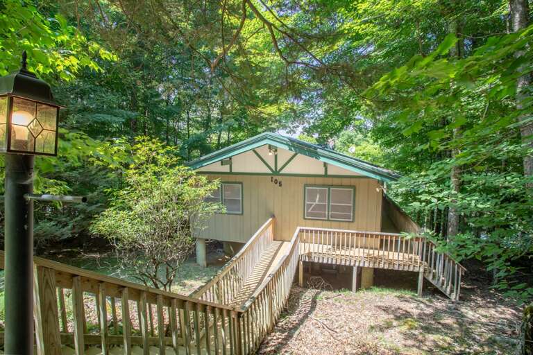 Front Exterior of Fern Cottage taken from top of the steps down from Parking Area