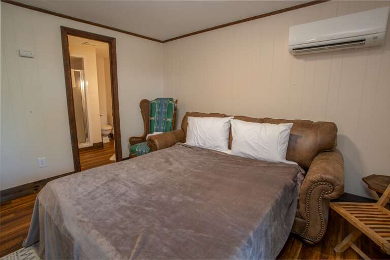 Lower Level Family Room Sofa converts to a Queen-sized Sleeper, adjacent to Full Bathroom