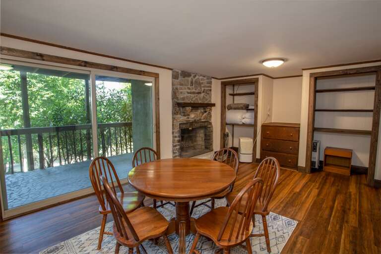 Lower Level Family Room with Table and Chairs for Games, Puzzles, Extra Dining, and more!