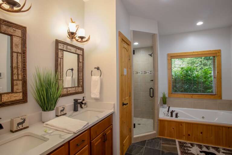 Master bathroom with jetted tub and separate tiled shower Master bathroom with jetted tub and separate tiled shower