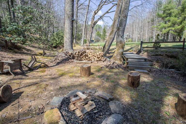 Fun Fire Pit area accessed by Foot Bridge over the Creek