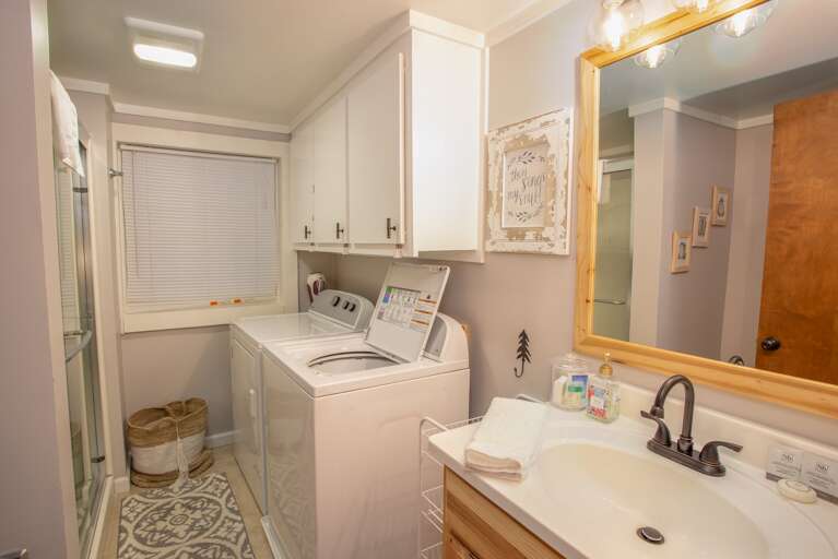 Full Bathroom on Main Level boasts large Shower and Washer/Dryer