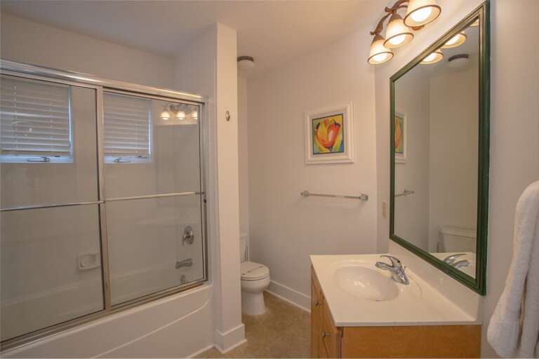 Two Twin Bathroom with Combo Tub and Shower